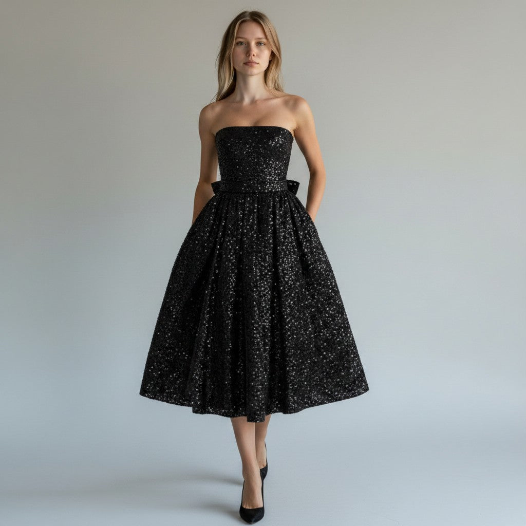 Women's glamorous sequin midi dress, a flowing silhouette for elegant occasion wear & fashion events.