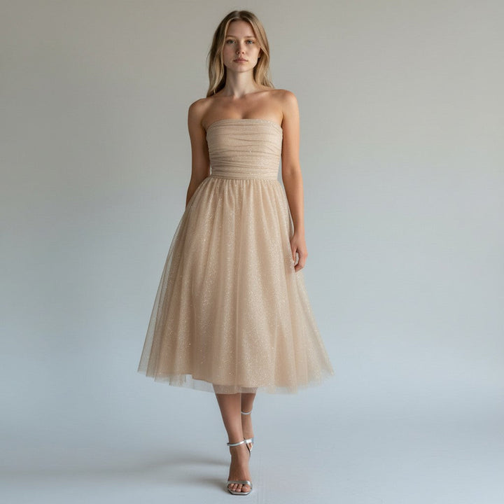 Stunning women's flowing sequin midi dress. Elegant sleeveless design for evening wear, parties & events.