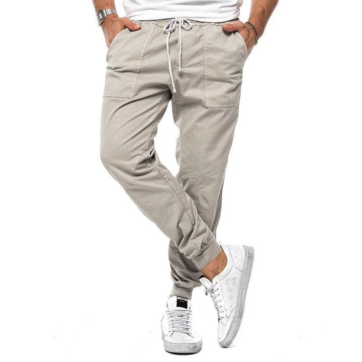 Men's elegant business casual chino trousers. Modern fit, comfortable stretch fabric, perfect for smart daily wear.
