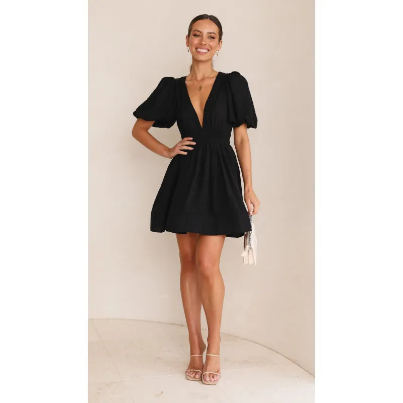 Women's elegant lightweight mini dress for summer. Versatile casual style, flattering fit for day-to-night wear.