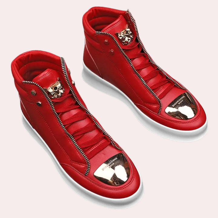 Edgy men's high top streetwear trainers featuring a striking metallic toe cap.