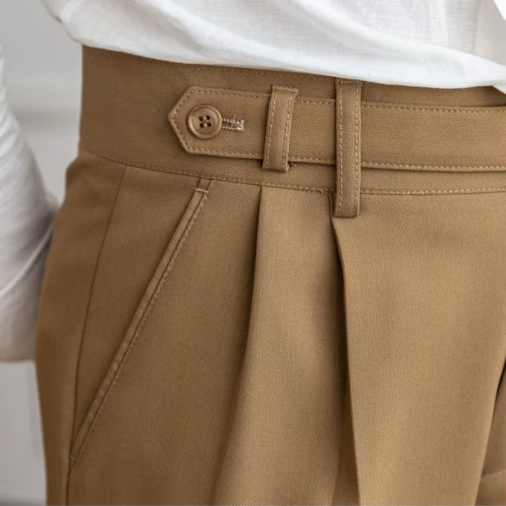 High-waist camel pleated chinos for men, merging classic tailoring with comfort.