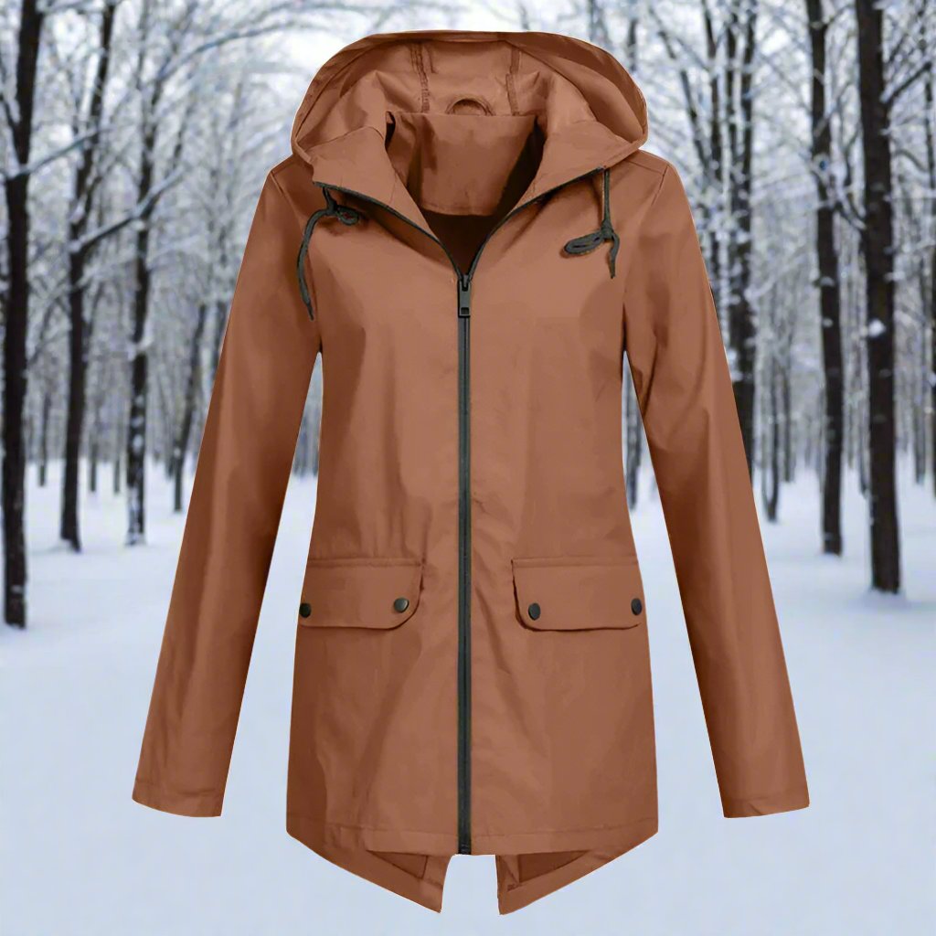 Functional women's rain protection: a hooded, waterproof jacket with adjustable cuffs.