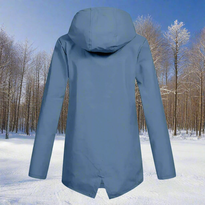 Durable women's all-weather jacket with hood & adjustable cuffs for superior rain coverage.