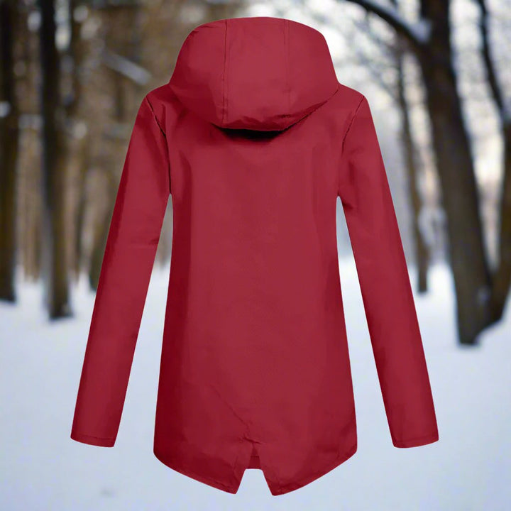 Essential women's lightweight rain jacket, fully waterproof with hood and adjustable cuffs.