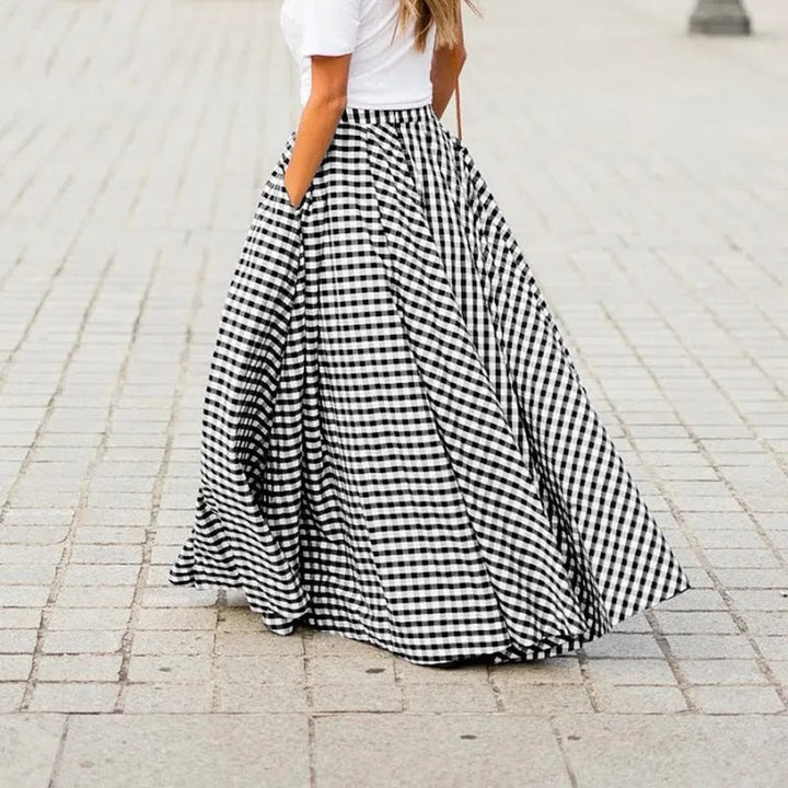 Black high-waist maxi skirt for women, versatile & modest, effortlessly stylish & long.