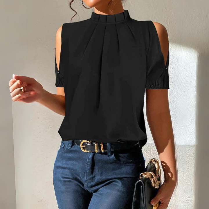 Chic black pleated top for women, featuring elegant split sleeves. Versatile for office, evening, or casual fashion.