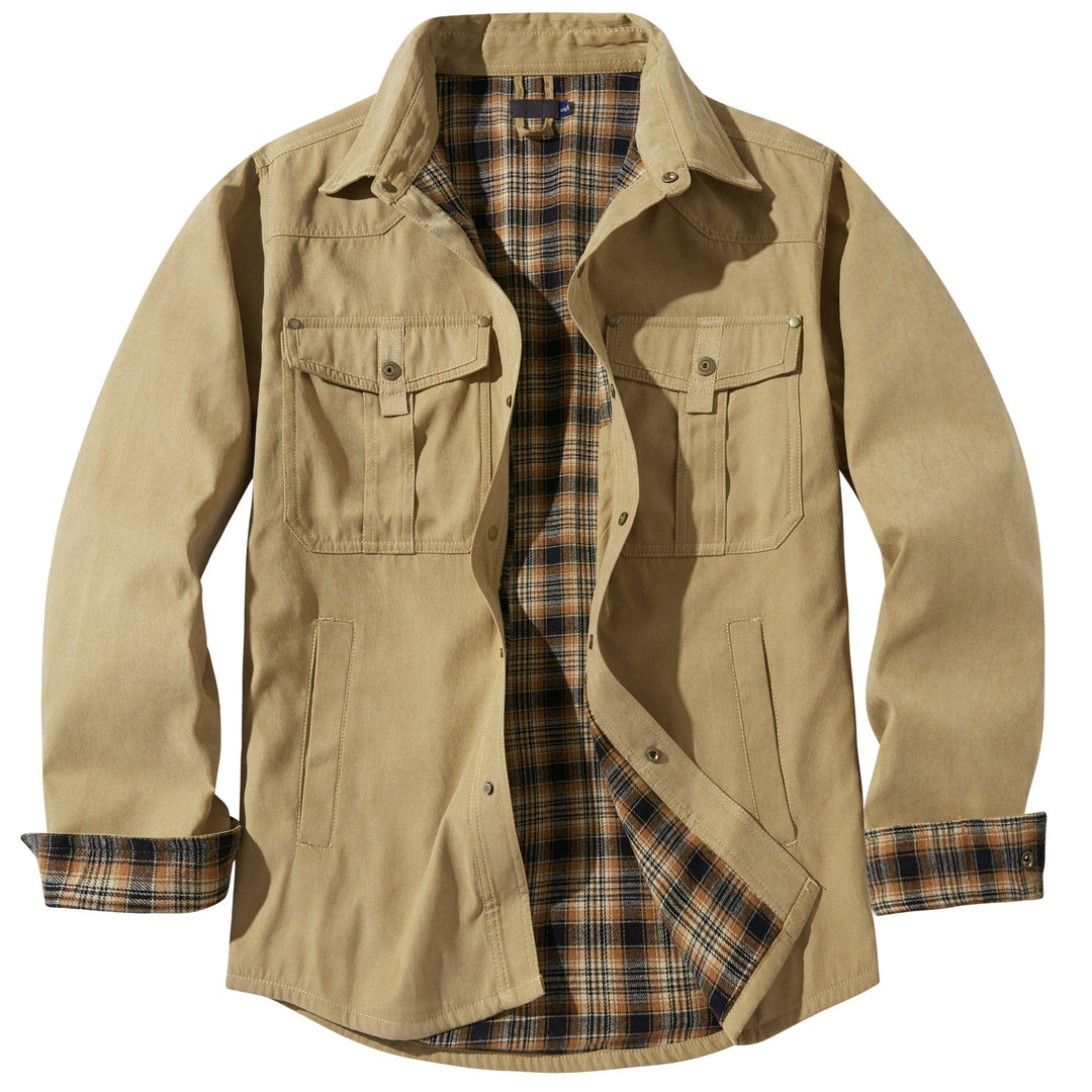 Model wearing men's insulated flannel jacket outdoors, casual & warm.