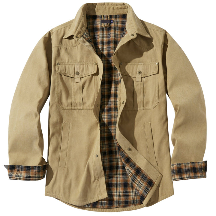 Model wearing men's insulated flannel jacket outdoors, casual & warm.