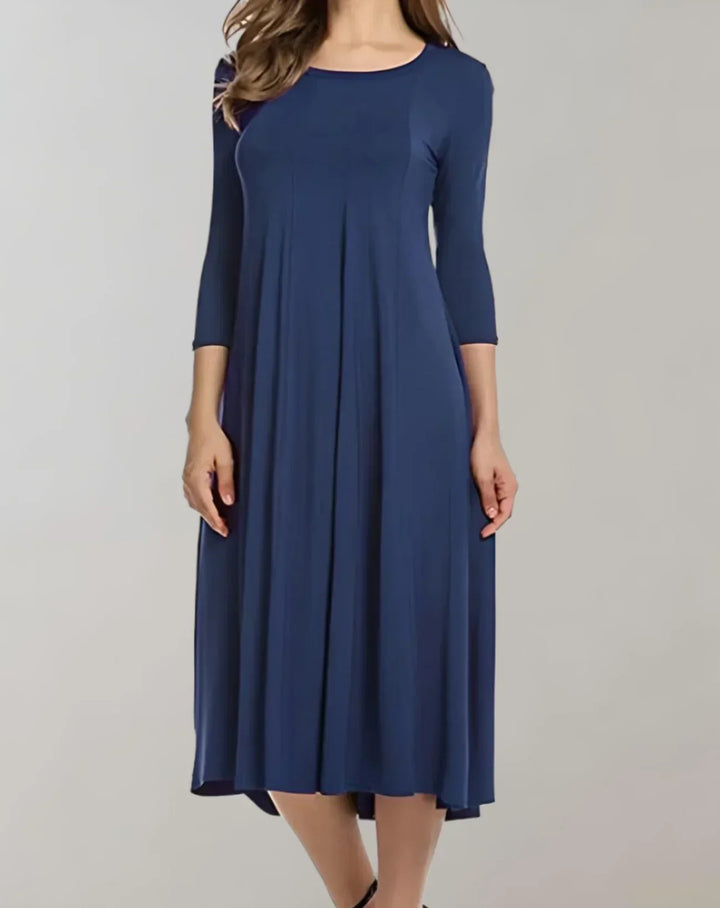 Women's elegant lightweight midi dress, perfect for everyday wear. Features three-quarter sleeves & round neck.