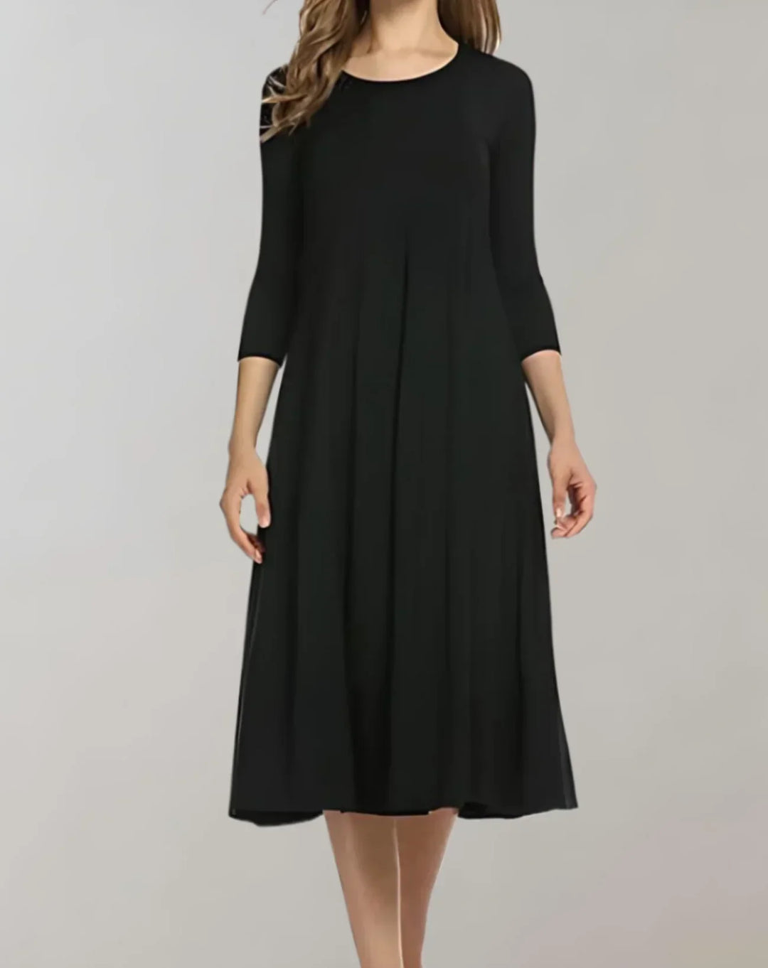 Comfortable women's lightweight midi dress, ideal for spring, summer, or fall. Features elegant pleats.