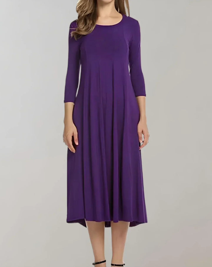 Versatile women's midi dress. Lightweight, elegant, 3/4 sleeve, round neck, perfect for day or evening.