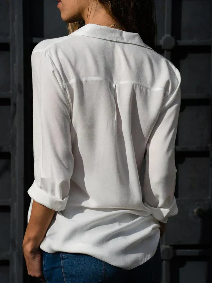 Women's versatile classic blouse. Elegant shirt perfect for office workwear or smart casual outfits.