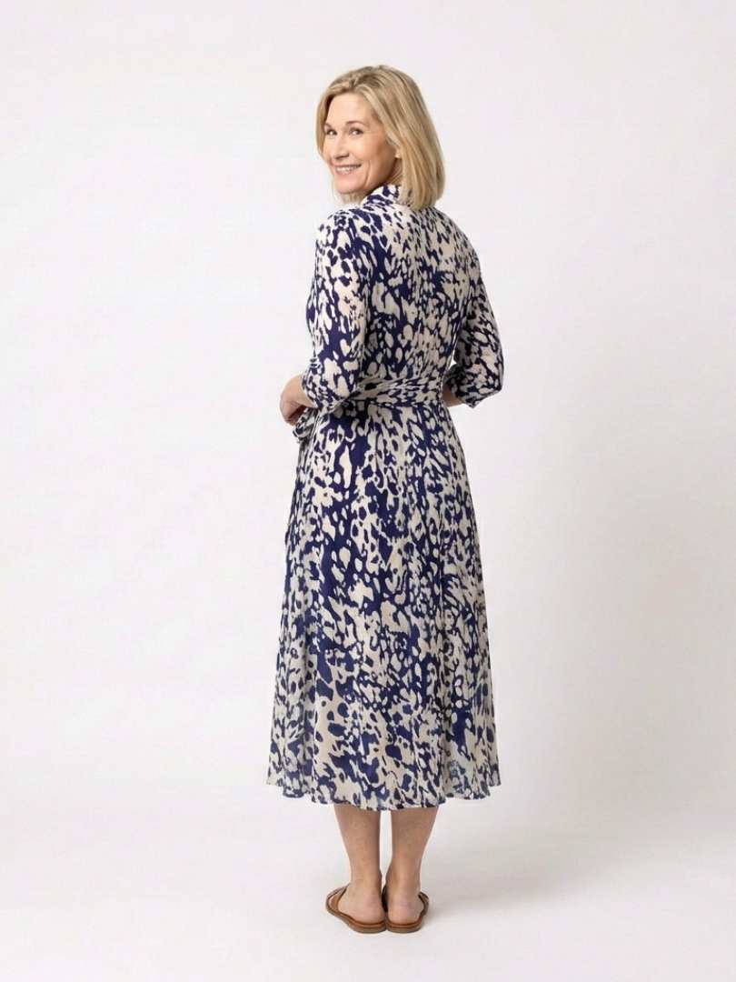 Comfortable long sleeve midi dress for women, featuring a chic collar & waist tie, ideal for casual or elegant occasions.