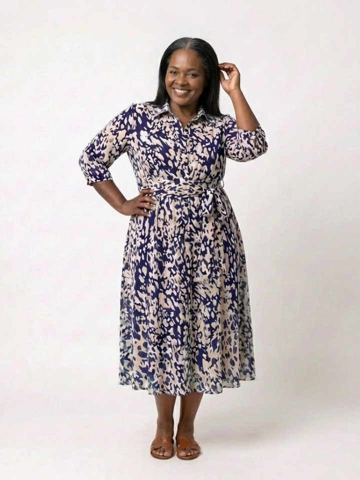 Flattering women's collared long sleeve midi dress with a comfortable waist tie, designed for elegant everyday wear.
