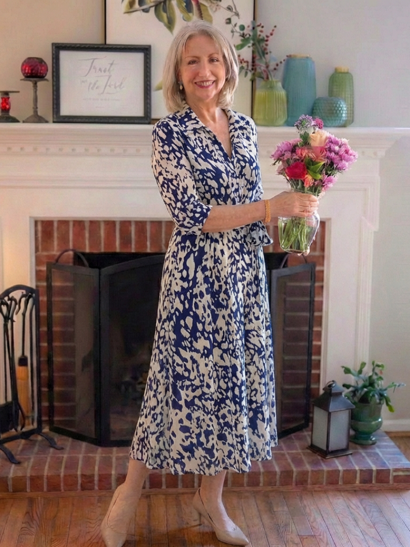 Chic women's long sleeve midi dress. Features a sophisticated collar & waist tie, offering a flattering, elegant look.