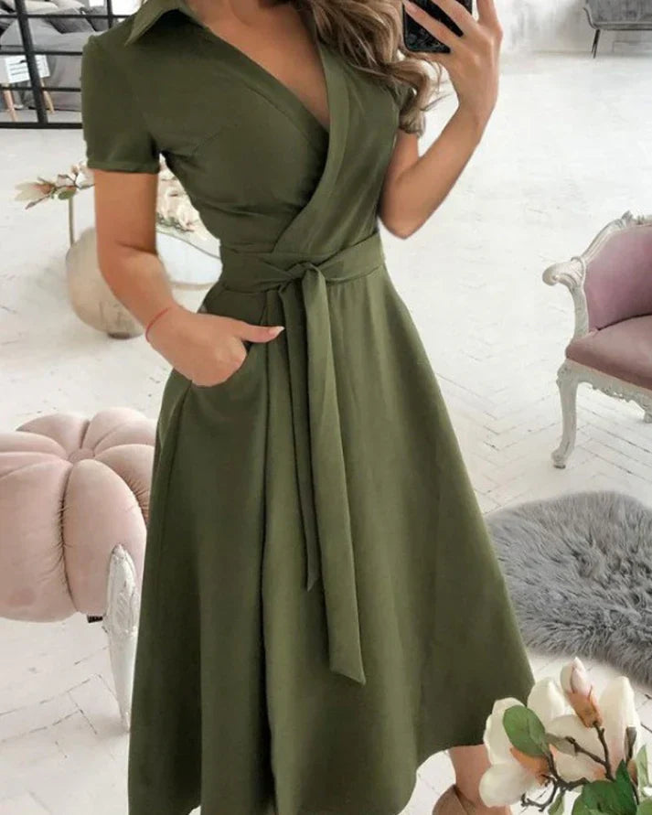 Elegant women's V-neck midi dress for sophisticated style. Perfect for occasion wear & parties.