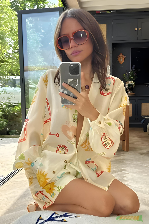 Detailed view of the women's long sleeve shirt from the two-piece summer set, featuring a stylish eclectic print.