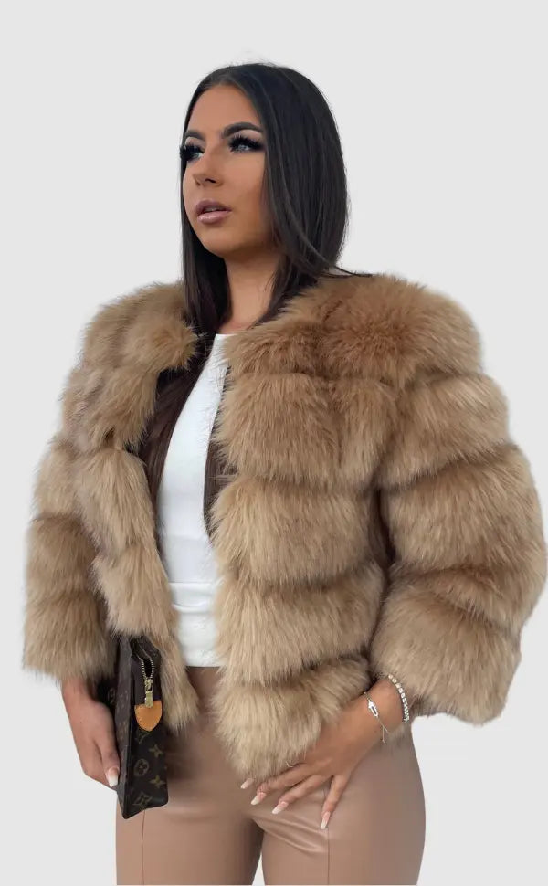 Elegant women's winter coat, stylish outerwear for cold weather fashion. Cozy & chic.