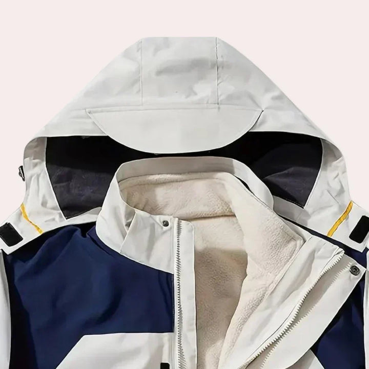 Stylish men's color block hooded jacket. A lightweight rain jacket designed for comfort and protection in changing weather.