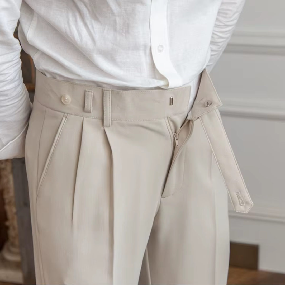 Sophisticated men's beige pleated trousers, a smart chino choice.