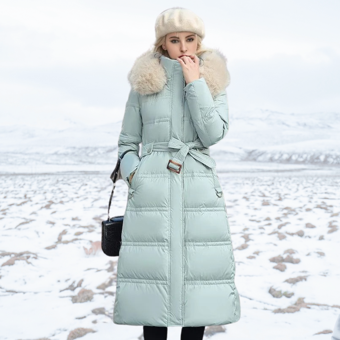 Protective women's winter parka with plush fur hood, offering warmth and style against cold weather.