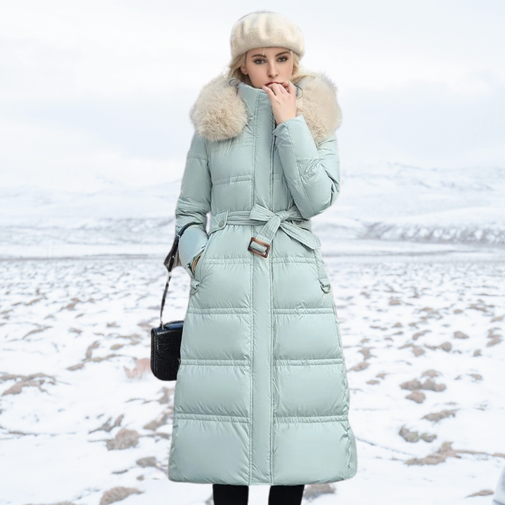 Protective women's winter parka with plush fur hood, offering warmth and style against cold weather.