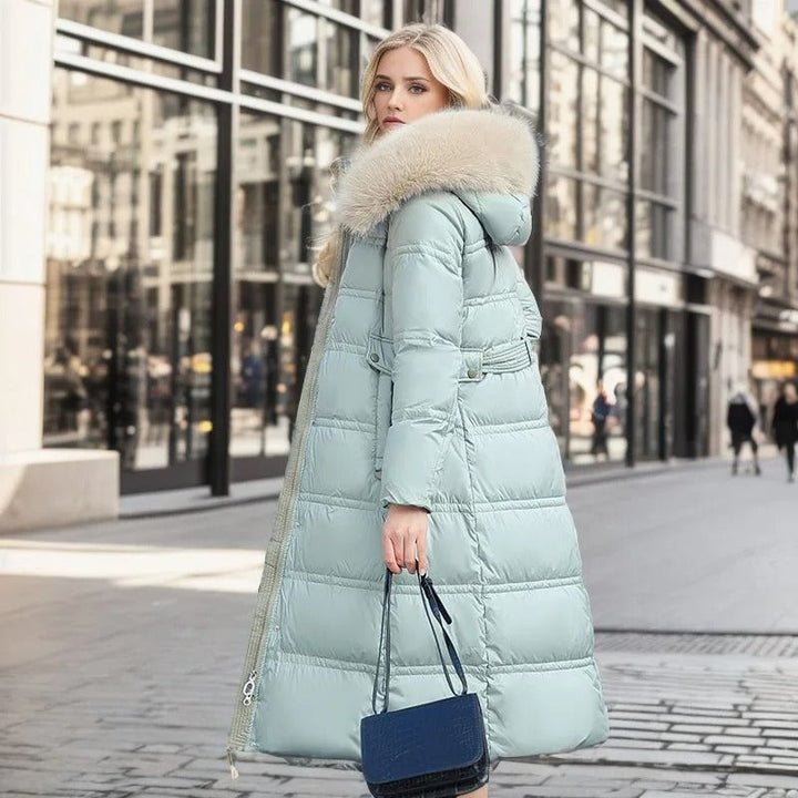 Modern women's stylish winter parka, a warm hooded coat with plush fur, essential for winter fashion.