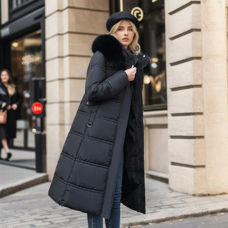 Warm women's winter parka, a cozy hooded jacket with plush fur for superior cold weather comfort.