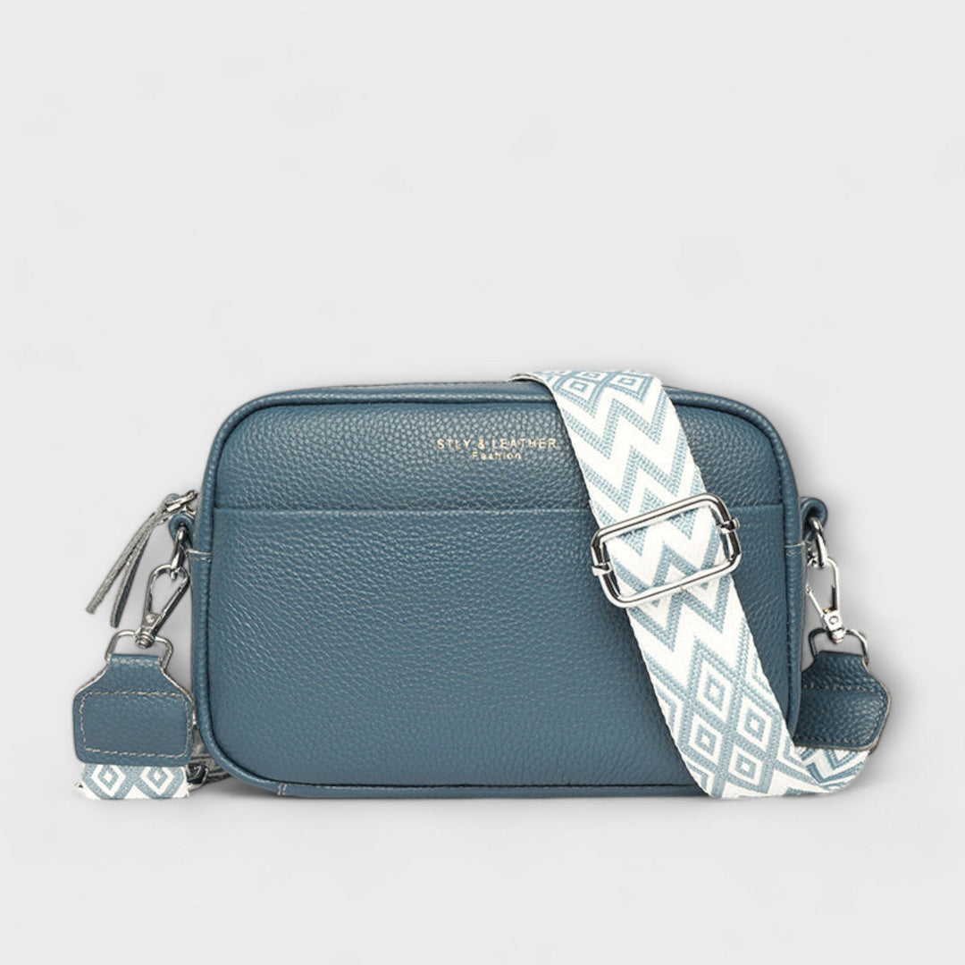 Chic elegant mini shoulder bag for women. Compact daily carry handbag, a stylish fashion accessory.