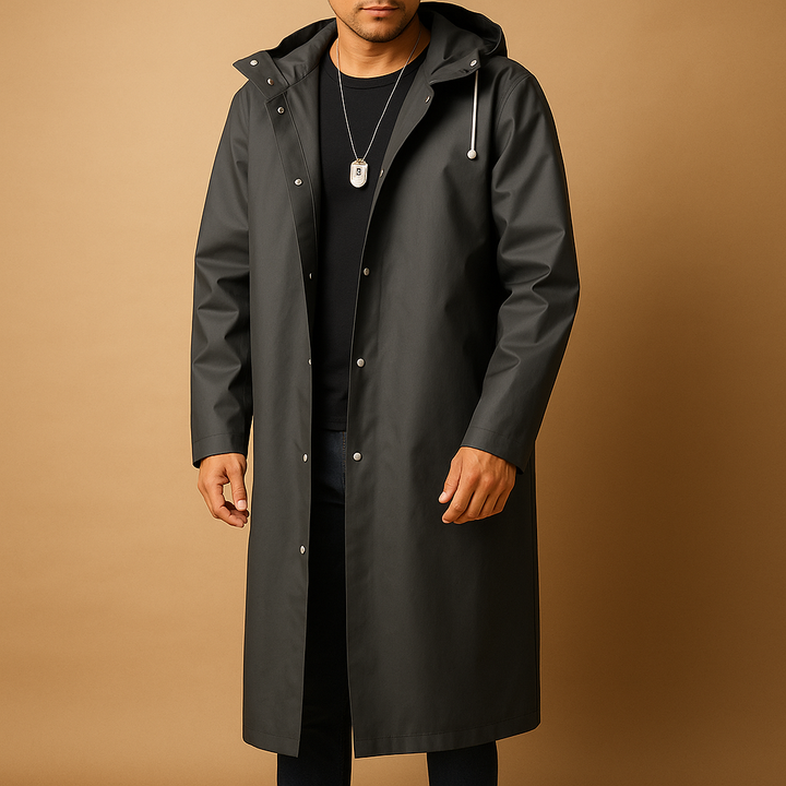 Man wearing a black waterproof rain jacket while hiking, providing weather protection for outdoor adventures.