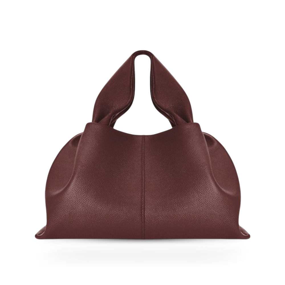 Elegant women's faux leather shoulder bag with a practical magnetic closure for everyday versatility.
