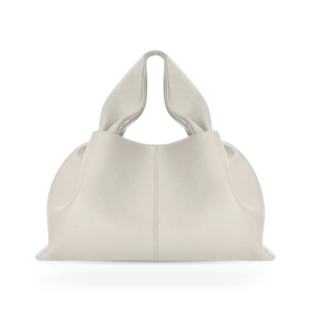 Sophisticated women's magnetic handbag, a durable faux leather shoulder bag for elegant daily use.