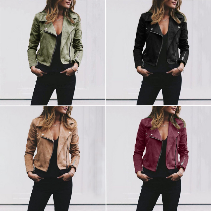 Women's chic black biker jacket with silver zipper details and buckle accents.
