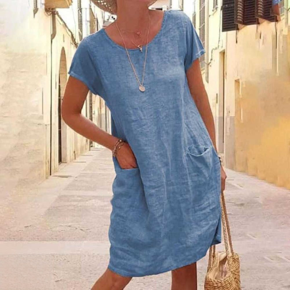 Elegant women's short sleeve daywear dress. A versatile casual tunic, ideal for everyday spring and summer style.