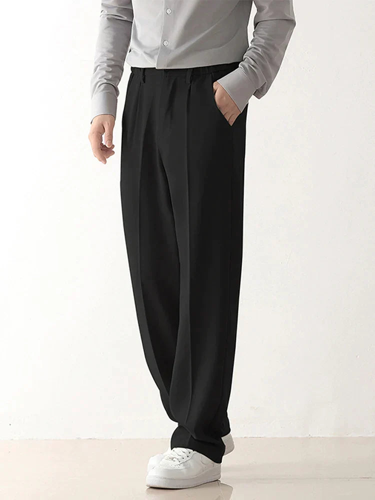 Black men's relaxed fit tailored trousers for business or smart casual style. Comfortable polyester blend.