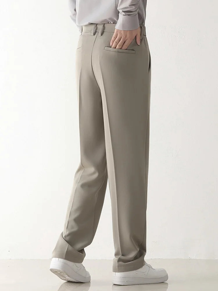 Comfortable men's tailored trousers in black, relaxed fit for versatile business and casual styling.