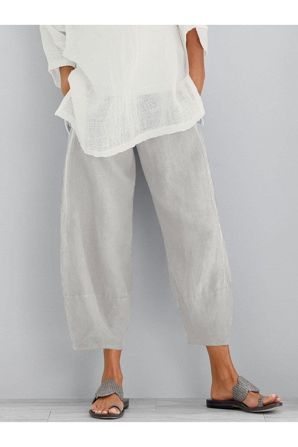 Women's loose fit ankle length summer trousers, perfect for casual or elegant warm-weather outfits.