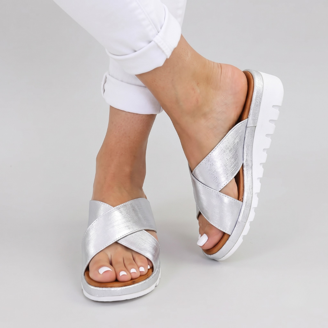 Slip-on women's summer sandals featuring orthopaedic arch support & comfort. Perfect casual footwear for holidays.