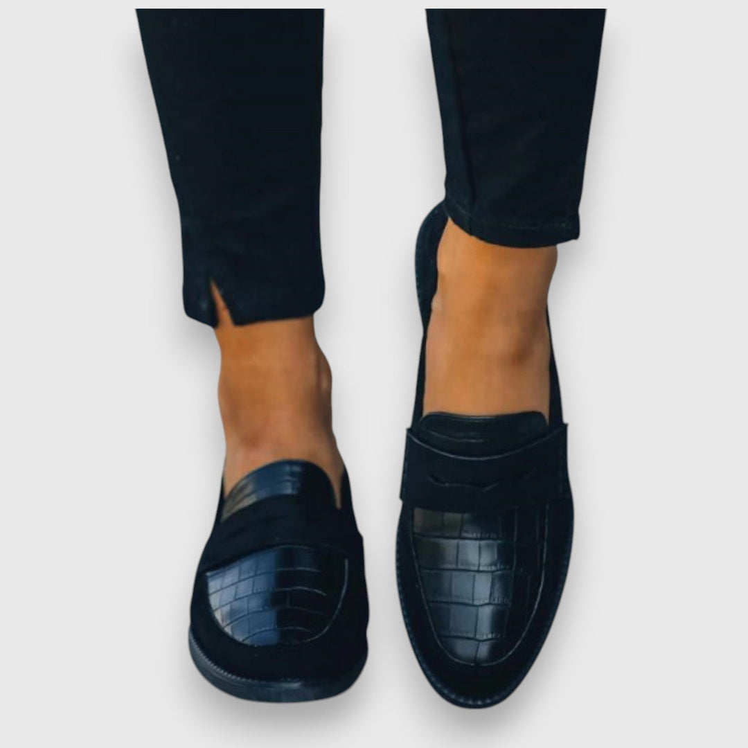 Comfortable women's walking loafers. Effortless slip-on flats for everyday wear, versatile for spring fashion.