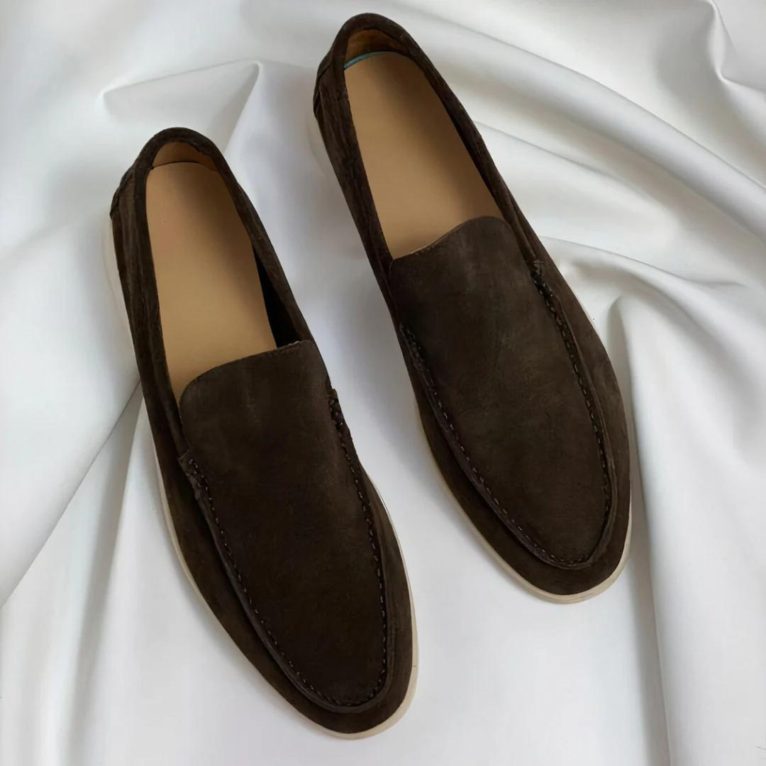 Brown leather men's slip-on loafers, offering effortless style and lasting comfort for daily fashion.