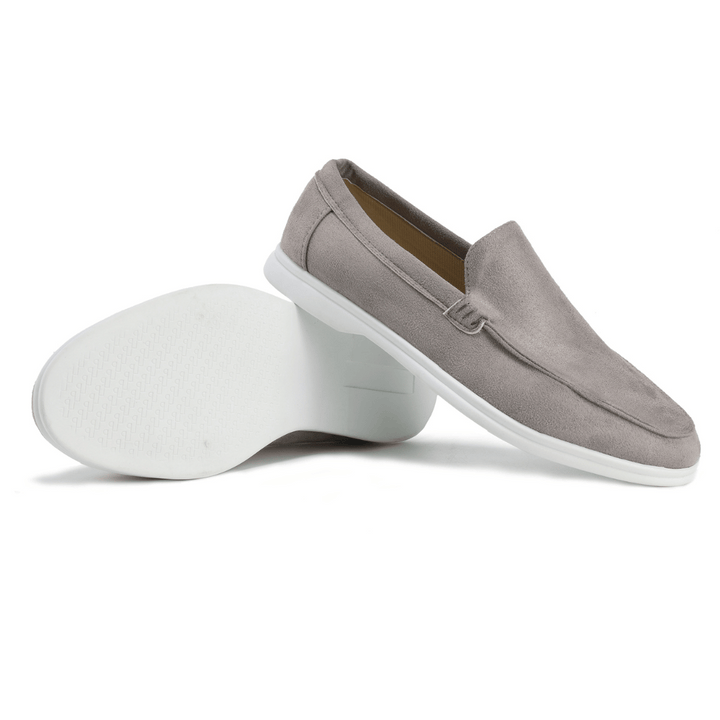 Modern men's slip-on walking shoes, grey suede loafers for casual fashion and comfort.