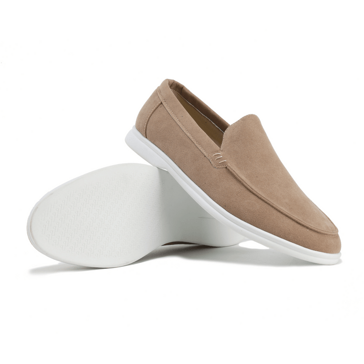 Tan slip-on loafers for men, a comfortable and versatile choice for everyday casual style.