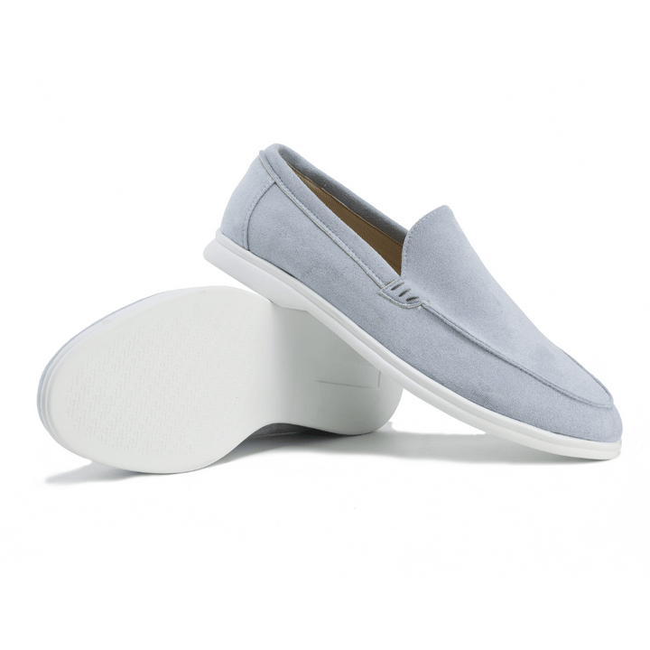 Comfortable men's brown slip-on loafers, ideal for walking, everyday fashion, and effortless style.