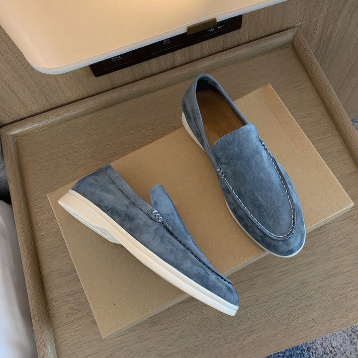 Sleek men's slip-on loafers, offering a blend of casual style and all-day comfort.