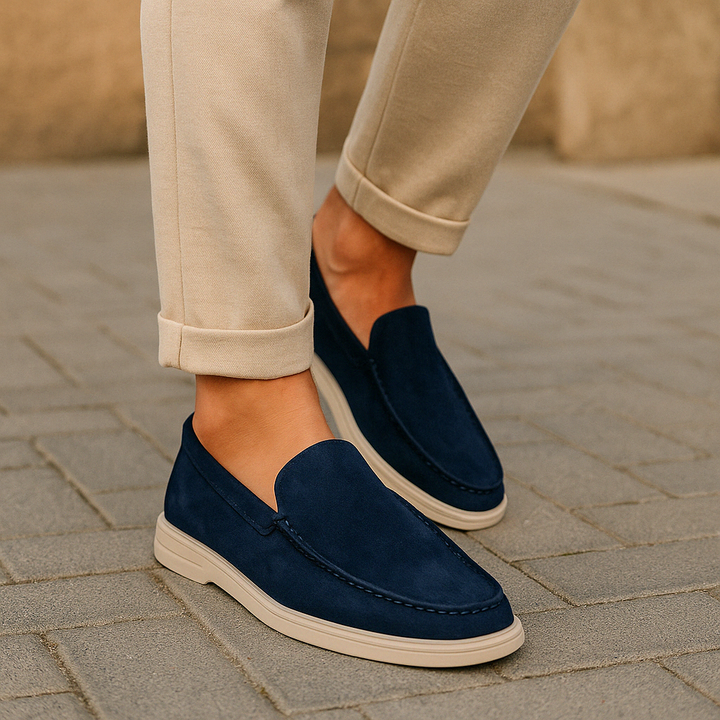 Men's versatile slip-on loafers, featuring stitched detail, perfect for casual fashion.