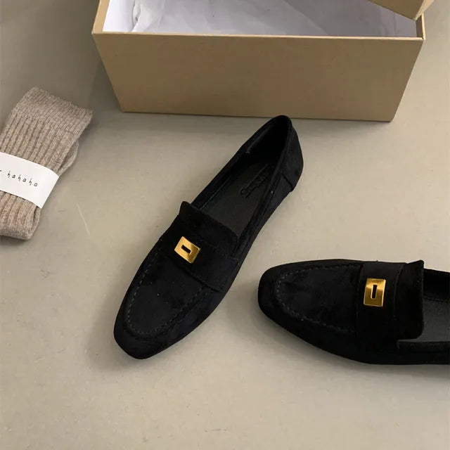 Slip-on women's flat shoes offering timeless comfort, perfect for everyday activities.
