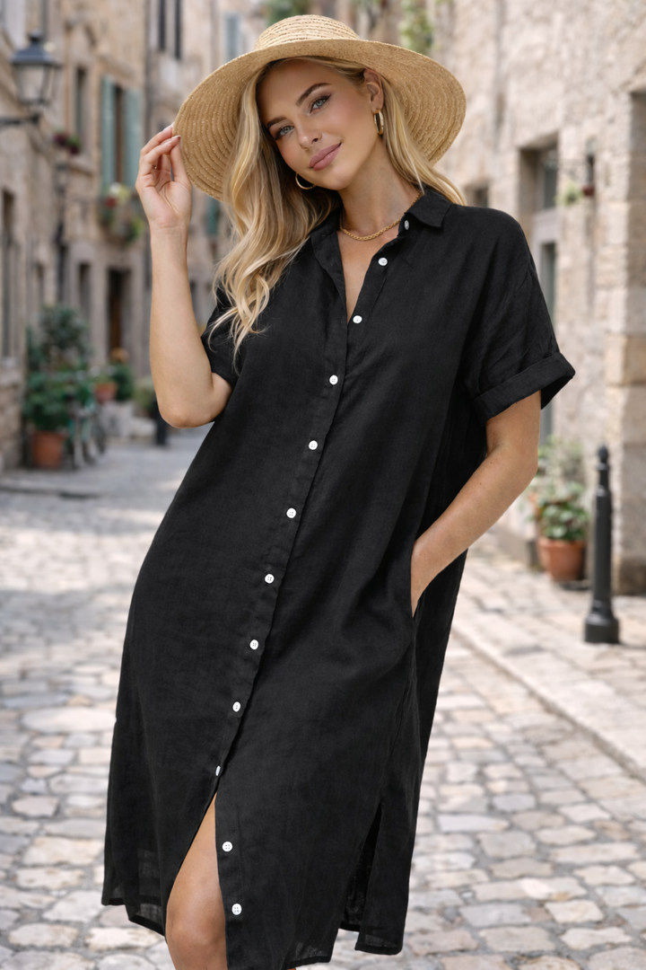Relaxed fit women's summer shirt dress with button front. Comfortable and casual, ideal for warm weather.