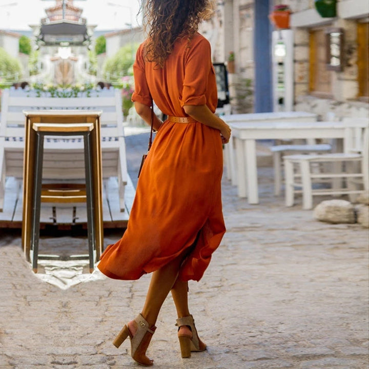 Boho-style women's long sleeve shirt dress with buttons & belt. Chic & comfortable for spring/summer fashion.