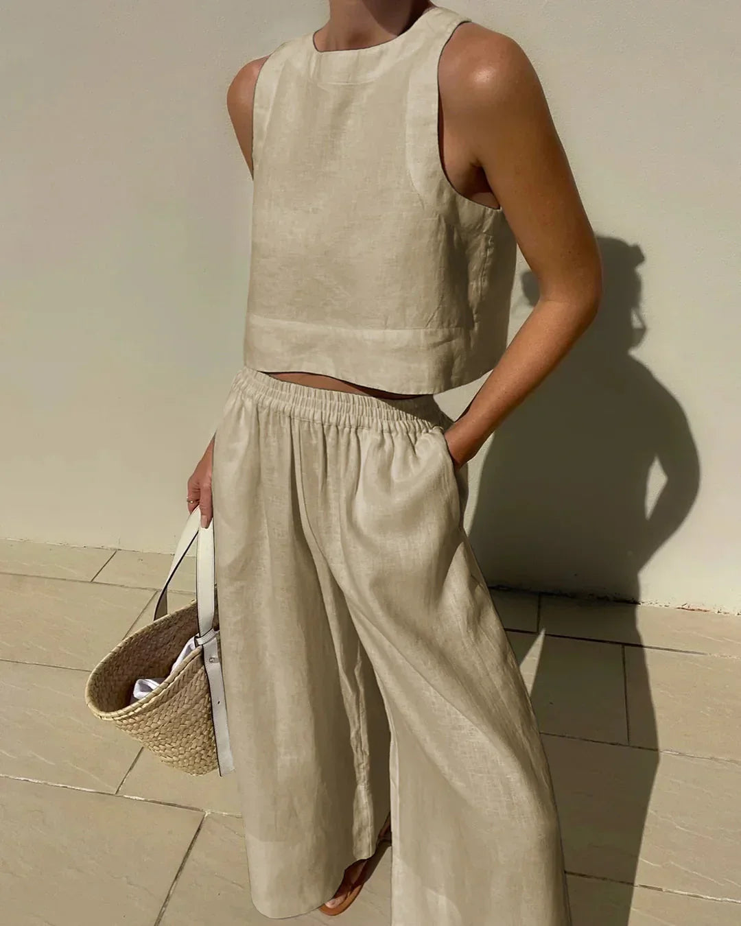 Women's sleeveless top with wide-leg capri pants set. Perfect for vacations & summer.